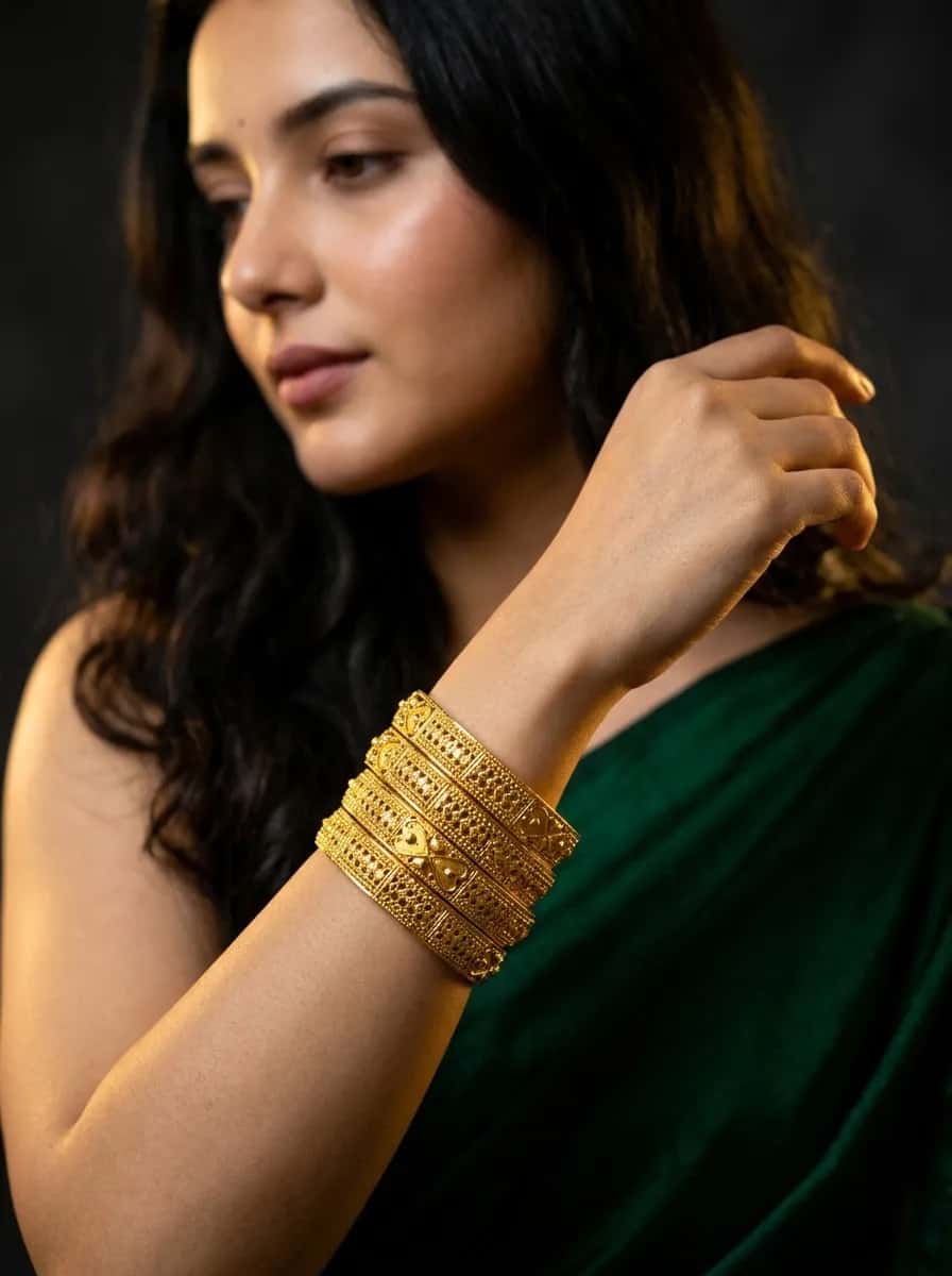 Woman_wearing_gold_bangles_202608281529 (1)